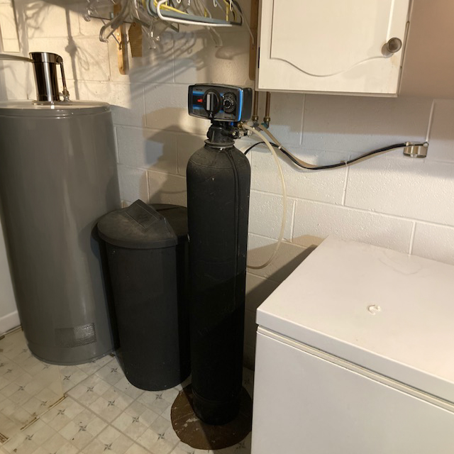 broken old water softener system
